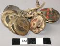 Brass discs for ornamenting fish skin garments