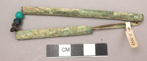 Brass beads from grave