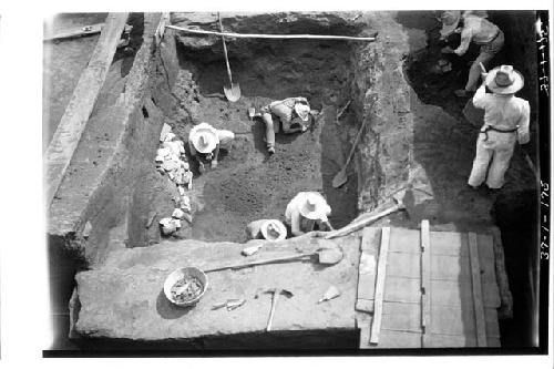 Men excavating structure