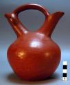 Stirrup vessel, modern native pottery.  Red matte glaze