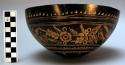 Gourd bowl with carved foral design - painted black