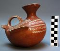 Effigy vessel in form of duck. red ware, white painted decoration. 17 x 12 x 15