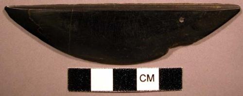 Blade of woman's knife, polished ground slate. No handle, straight back, sharp.