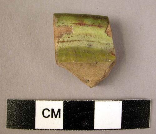 Rim potsherd - green glaze