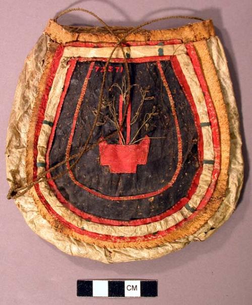 Bag made of skin with leather decoration