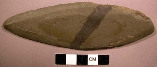 Groundstone implement of green slate--biface. Probably a (man's) knife.