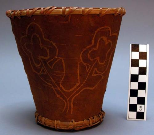 Birchbark containers, one has etched floral motif