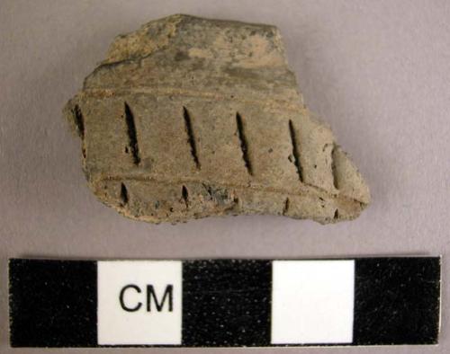 Potsherd--incised design