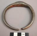 Iron bracelet - njamdi - has medicine imbedded or enclosed in the "hump"