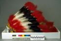 Beaded leather banded feathered headdress - tipped with red feathers