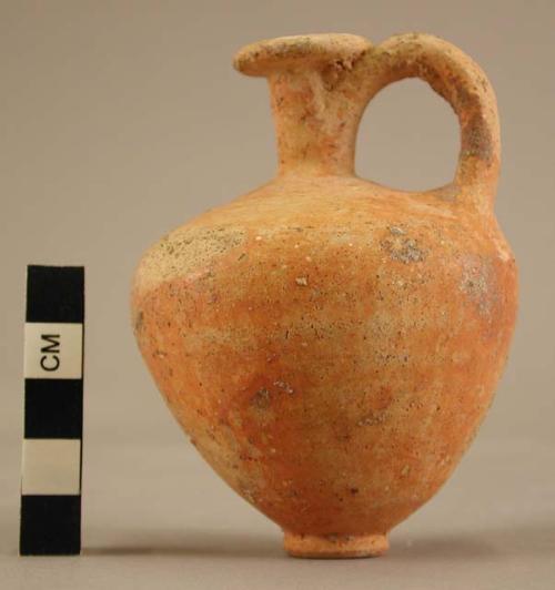 Red slipped burnished pottery juglet