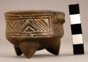 Miniature black pottery tripod vessel - incised decoration