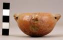 Miniature rounded-bottom pottery vessel - decorated with adornos