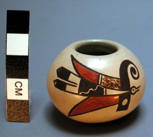 Miniature jar, polychrome, with corn kernels and seeds inside