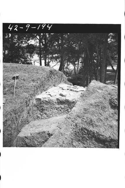 Flagstone paving exposed in east penetrating trench