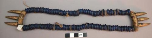 Bead necklace with brass claws