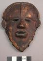 Brass replica of mask