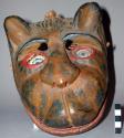 Wooden painted puma dance mask. Used in Baile del Venado.
