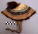 Hat, hide and fur crown, trim and chin strap, embroidered cloth band borders