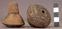 Terra cotta spindle whorls ornamented with incised lines