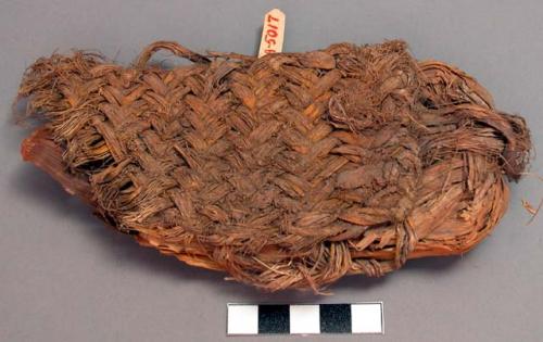 Fragment of sandal and pad of corn husks