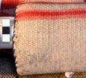 Banded blanket, white with red & black stripes