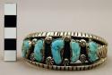 Cuff bracelet, silver w/ stamped decoration adorned w/ turquoise nuggets