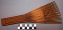 Wooden comb - 21 tines, fan-shape, made of separate sticks bound together with w