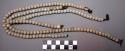 Necklaces, white beads, olunigi lwomukala