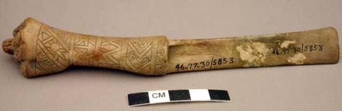 Bone spatula - fist-shaped handle with shell inlays