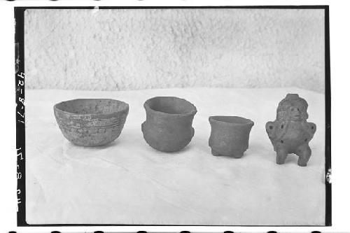 Four pieces of pottery from Burial #2.  #9, #10, #11, #12