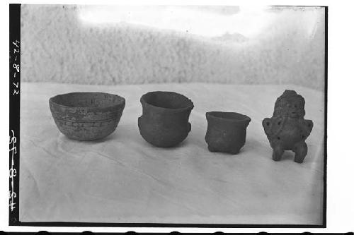 Four pieces of pottery from Burial #2.