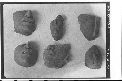 Six pottery heads