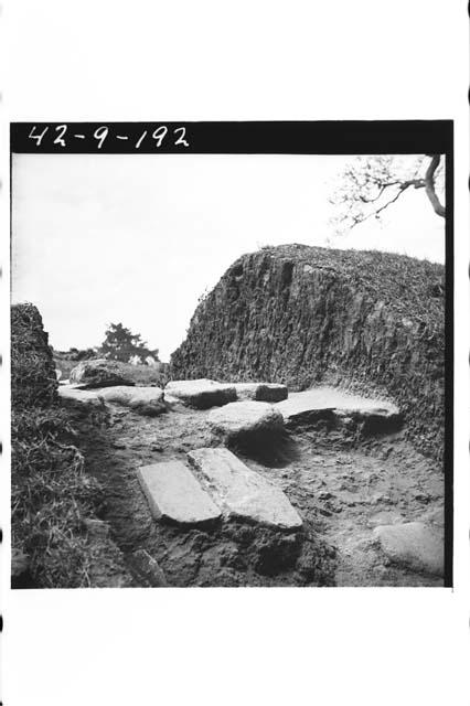 Flagstone paving exposed in east penetrating trench