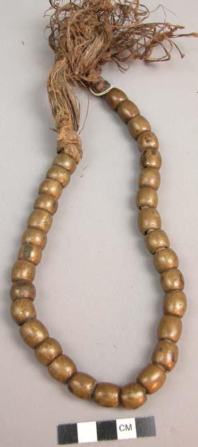 String of very old cast brass beads of native manufacture