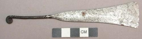 Metal knife; one flat blade; with a spiral-twisted handle, curled at the end