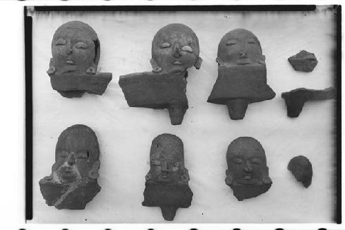 Pottery human effigy heads