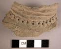 Rim sherd of grey ware - coiled neck with added perforated filletted knobs