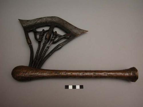 Ceremonial axe, two masks