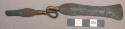 Metal knife; double ended with central thinner portion twisted into an S shape a