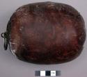 Goat skin over wood vessel for oil or medicine (dabbah)