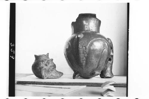 Plumbate miniature pisote head and plumbate animal effigy.