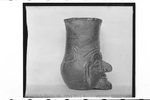 Plumbate head jar, bearded;