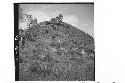 Men at base of southwest corner of largest mound