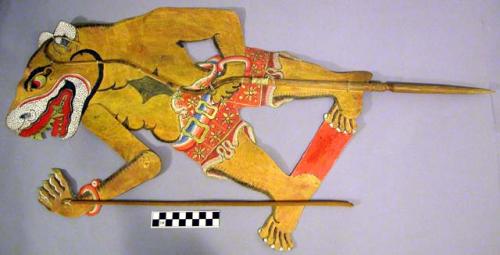 Shadow puppet depicting character Buta Macan