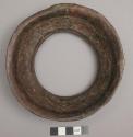 Container, copper rim, circular, flared, hole in center