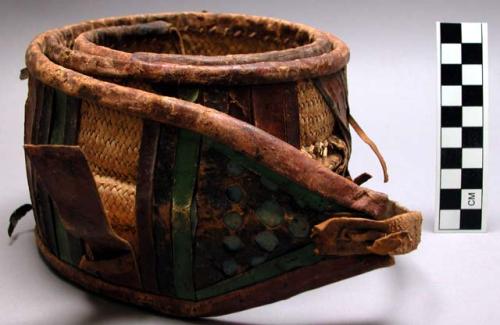 Belt of basketry worked with colored leather