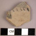 Black on grey potsherd