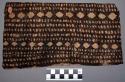 Tapa fragment, rectangular, buff with brown pigmented diamonds and dots
