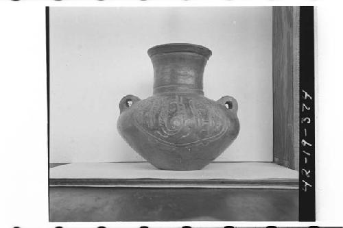 Plumbate standad jar, incised medallion, handles.